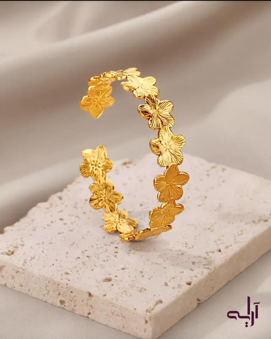 Gold-toned Arayeh cuff bracelet styled on ivory stone