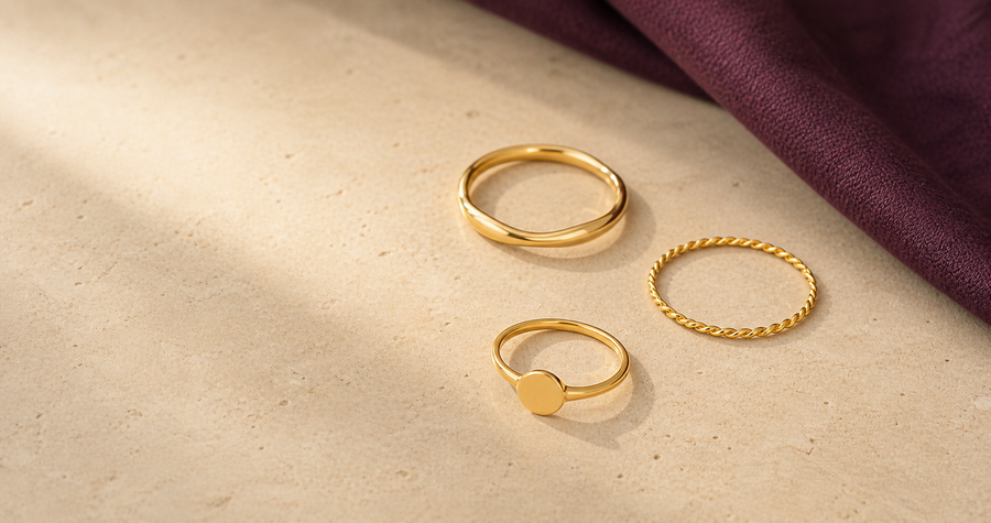 Gold-toned Arayeh rings styled on ivory stone